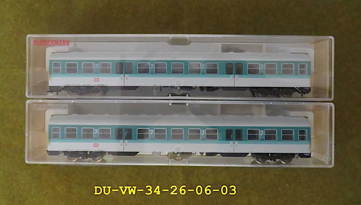 2 Fleischmann intermediate coaches 4439K and 74439 for railcar BR 614 in H0 scale