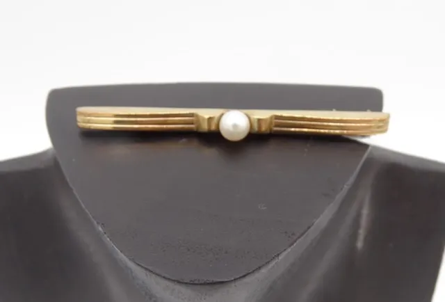 1 broche or 333 avec perle
