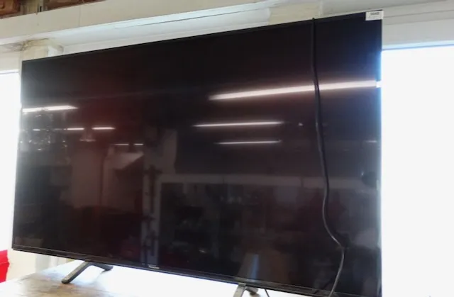 1 Panasonic TV + remote control