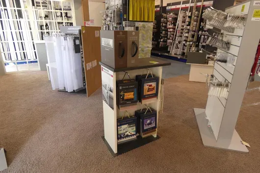 Sample stand, with contents (upholstery fabrics)