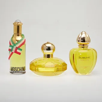 CHOPARD, JEAN PATOU & MOSCHINO. Lot de grands factices / flacons, verre, plastique, années 1980/90. (3).