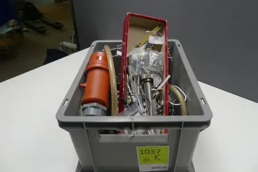 Small parts assortment (CEE plugs, braided hose, stainless steel wire frames, small parts)