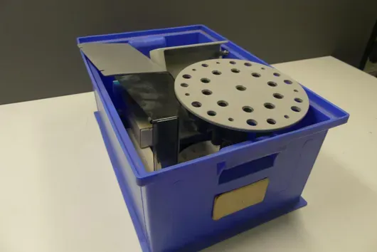 Laboratory accessory assortment (perforated sample holders, sheet metal housing parts, plastic covers)