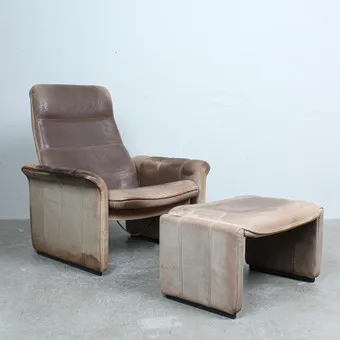 DE SEDE. Sessel mit Ottomane, Modell 'DS-50', Leder, Schweiz, 1970er Jahre.