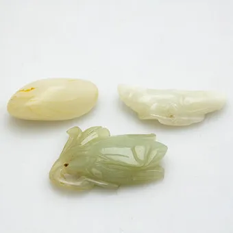 Three jade pendants, China, late Qing dynasty (3).
