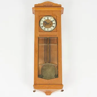 Art Nouveau wall clock, wood, 20th century.