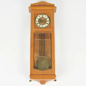 Art Nouveau wall clock, wood, 20th century.