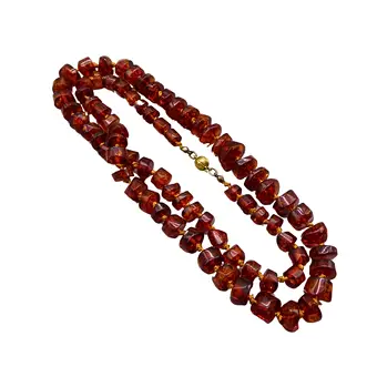 Barnsteen ketting met een sluiting van 333 goud.