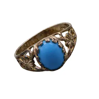 Bague en argent 925 sertie d'une turquoise, travail filigrane