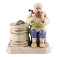 Salière figurine avec un paysan buvant de l'eau à une kovsh
