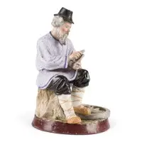 Un artisan avec une hache