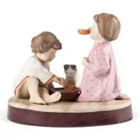 Enfants avec chat au déjeuner