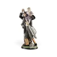 Groupe de figurines 'Chasseur avec sa fille sur l'épaule'