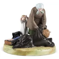 Groupe de figurines 'Paysanne avec enfant relevant son mari ivre'