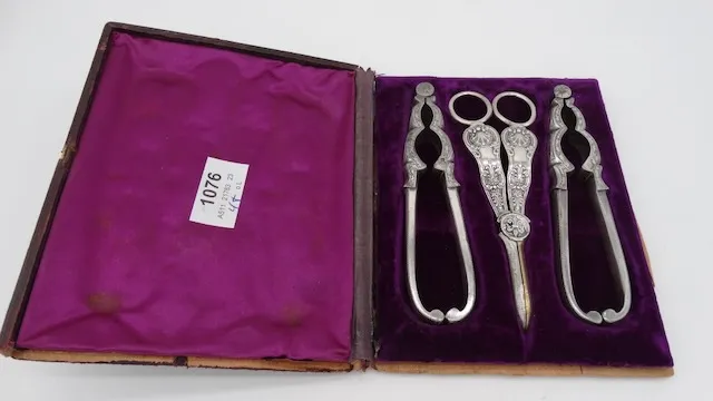 2 nutcrackers and 1 grape scissors