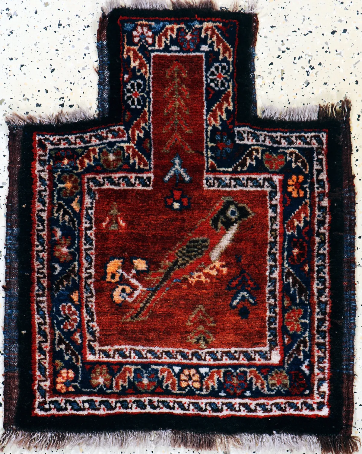 Ghaschgai "salt bag face", Persia, early 20th c., wool on wool, approx. 76 x 64 cm