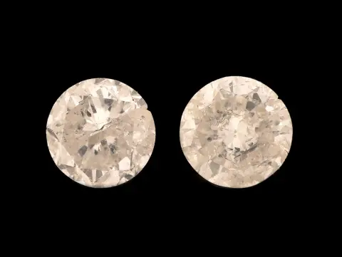 2 briljanten totaal ca. 0,73 ct Wit.l. ges. Wit/p, diameter ca. 4,4 - 4,45 mm