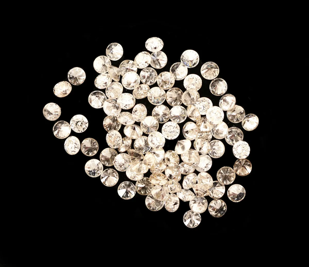 Lot losse briljanten, totaal ca. 1,00 ct wit - licht getint wit/vs-p, diameter ca. 1,25-1,29 mm