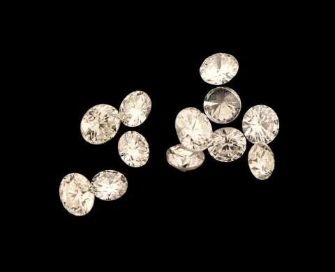 Lot de 12 diamants lâches, tot. env. 1,94 ct, blanc teinté blanc/p 1
