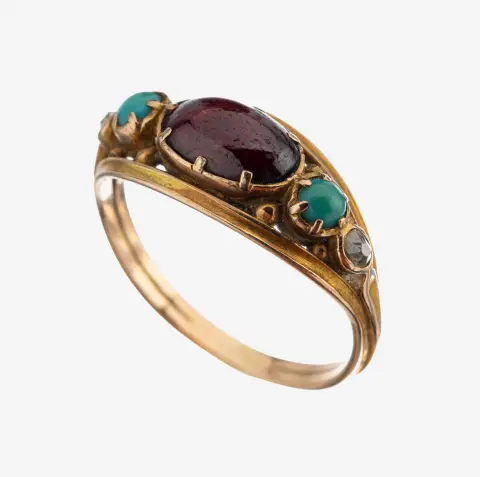Bague grenat-turquoise-diamant en or 14 kt, vers 1900, or 585/000, cabochon grenat ovale