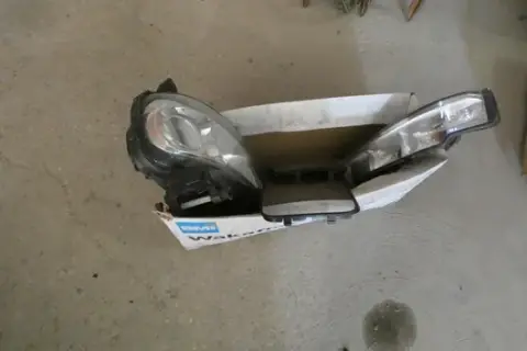 Car headlights and Mercedes-Benz exterior mirror