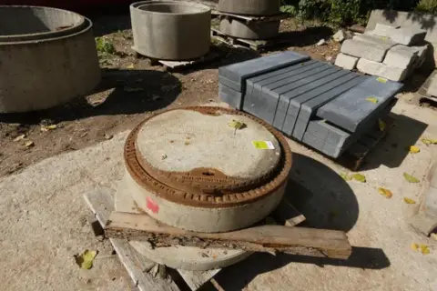 Concrete manhole cover