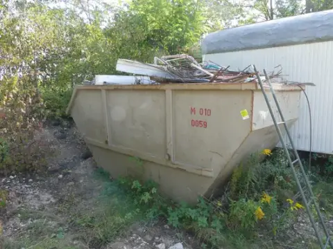 Steel container with scrap steel