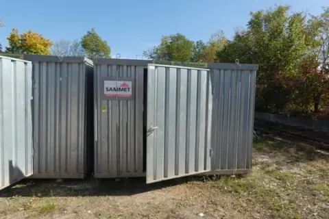 Construction material container, galvanized steel, with contents