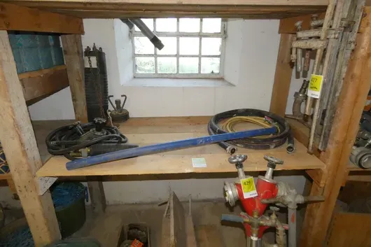Lot of hoses with couplings, pipe stop plugs and accessories