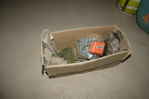 Box with fastening material