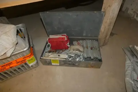 Metal case with a lot of door fittings (including long plates, locks, hinges, strike plates, keys)