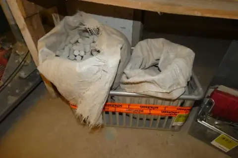Crate with 2 bags of fibre concrete closure plugs for spacer pipes