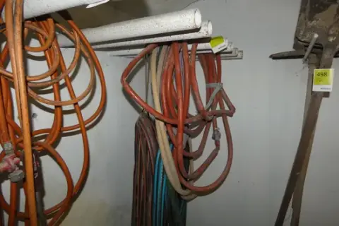 Lot of hoses, including garden hoses