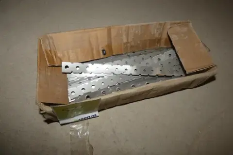 Box with masonry connectors, perforated stainless steel strap