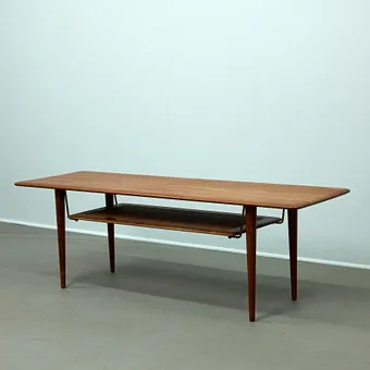 PETER HVIDT AND ORLA MOLGAARD-NIELSEN. France & Son, coffee table, model 'FD 516', teak, rattan, brass, Denmark, 1960s.