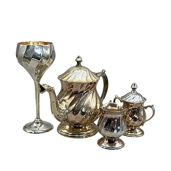 VIERTEILIGES SERVICE-SET AUS METALL - BAROCKSTIL.