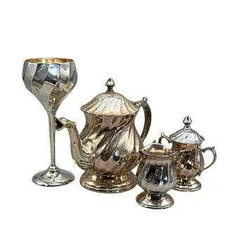 VIERTEILIGES SERVICE-SET AUS METALL - BAROCKSTIL.