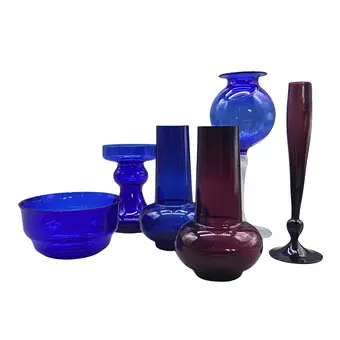 Set of six blue and violet glass objects.