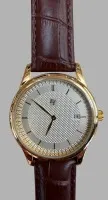 Ultra-thin men's watch "ET" quartz, as new, original protective film on back, approx. 40 g. Size (Ø, H): 4 cm, 0.7 cm. Colour: gold, white, brown (strap).