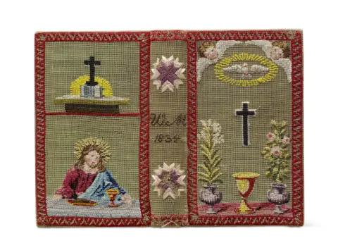 Reliure brodée de couleurs avec symboles chrétiens