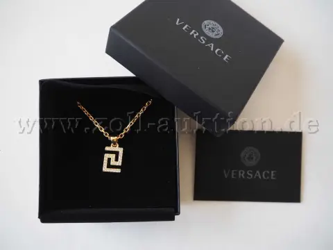 1 collier Versace avec strass