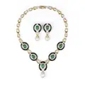 Opulent Lavallière gold necklace and ear clips with emerald cabochons, onyx and diamonds.