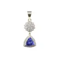 Necklace pendant with diamond flower and trillion tanzanite (approx. 3.2 ct).