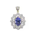 Flower-shaped necklace pendant with diamonds and tanzanite.