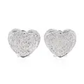 Heart-shaped pavé diamond stud earrings.