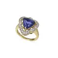 Large entourage ring with tanzanite trilliant (approx. 4.7 ct)