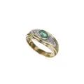 Yellow gold ring with pale green emerald