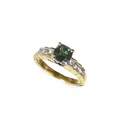 Delicate yellow gold ring with deep green tourmaline solitaire.