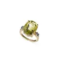 Yellow gold ring with large yellow-green quartz solitaire.