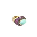 Entourage ring with turquoise cabochon and rubies (approx. 9.5 ct). Le Vian, USA.